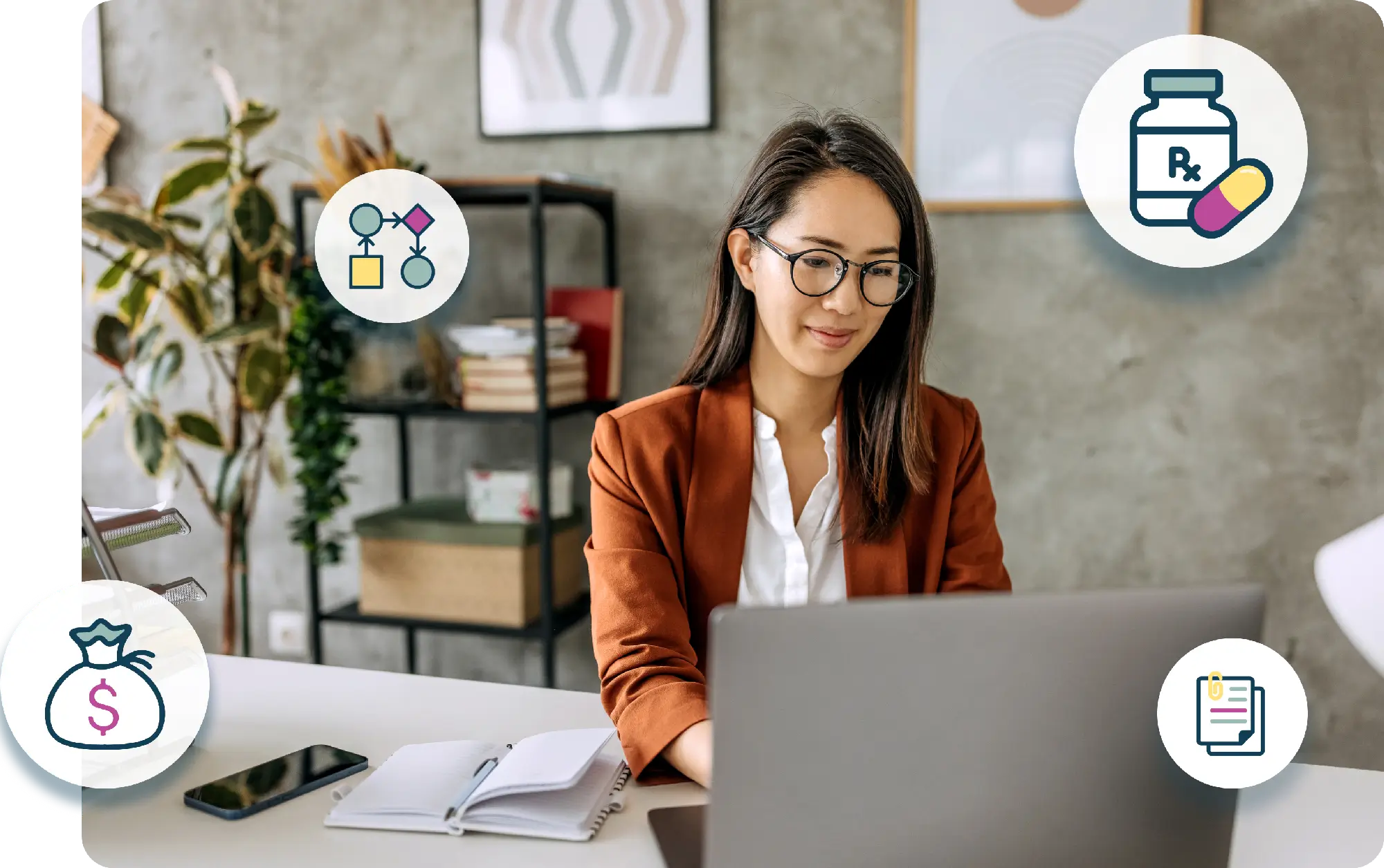woman-in-a-brown-blazer-works-on-a-laptop-at-a-desk